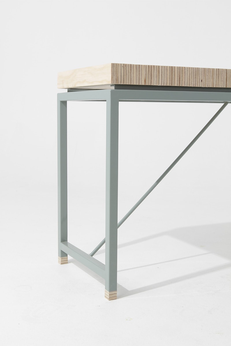 Custom powder-coated steel frame with ply seat