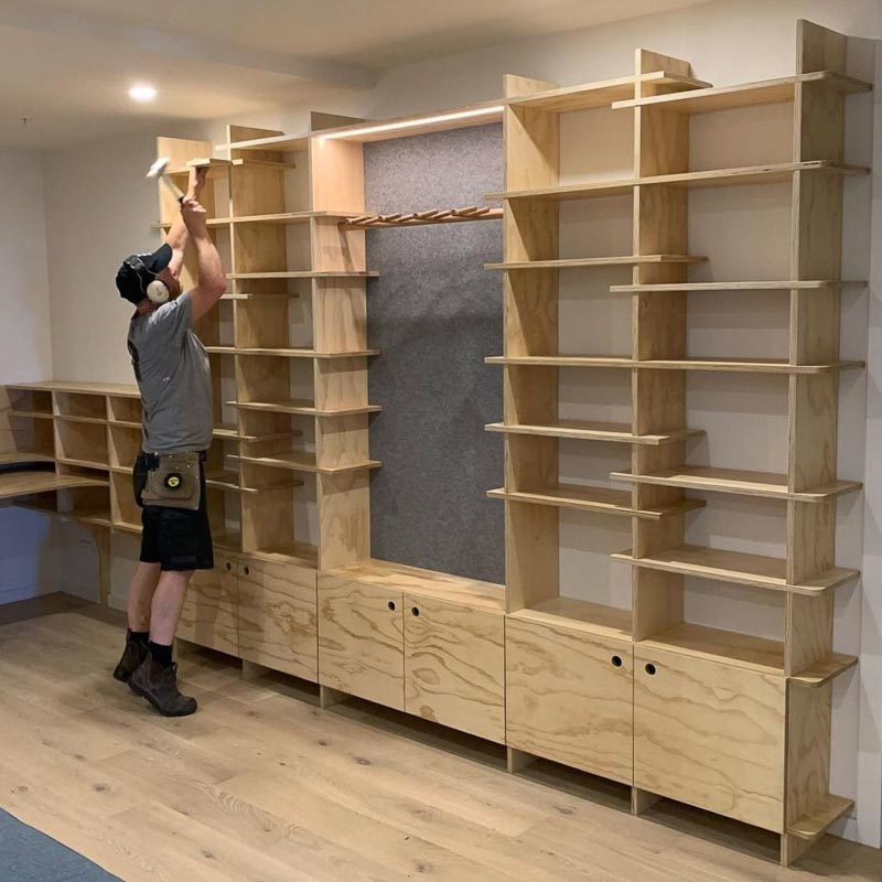 Custom shelving being installed